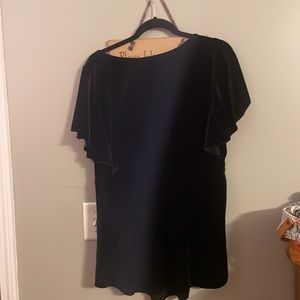 Short sleeved Valore shirt with baby doll sequin around the waist.